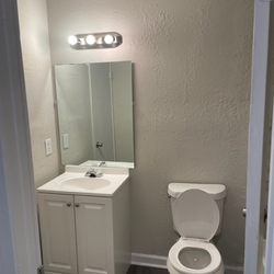 bathroom at Creekview Apartments Located in Scottdale, Georgia