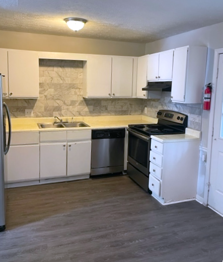 updated kitchen at Creekview Apartments Located in Scottdale, Georgia